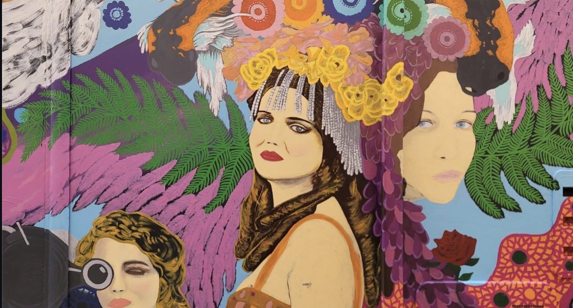 Pinkford RV mural detail — golden headdress portrait