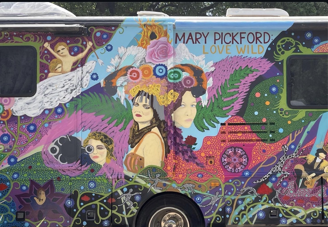 Pinkford RV mural — winged figures and fern