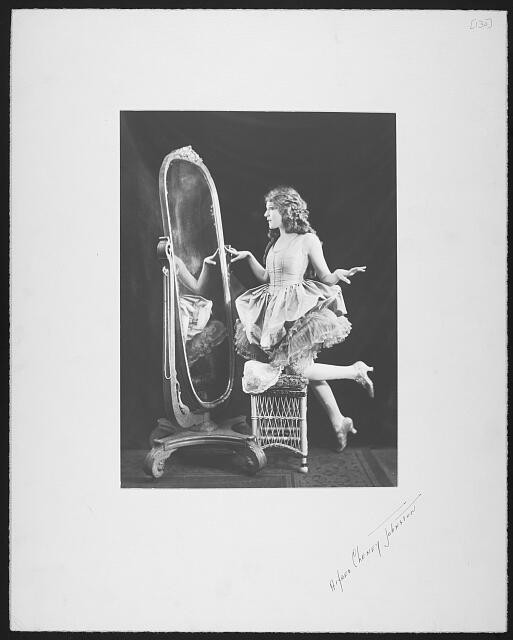 Mary Pickford in front of mirror